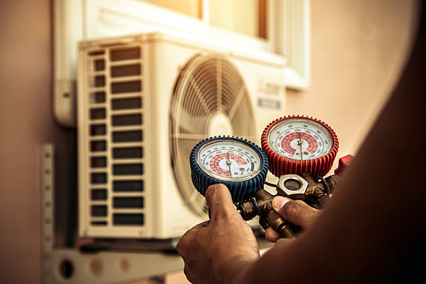 Professional Air Conditioning Service technician working in Pennsburg, PA